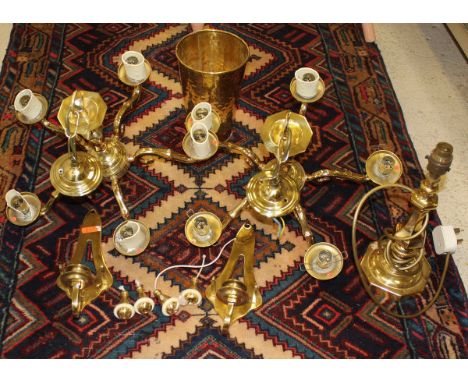 A brass hanging light, brass candle wall light, brass candlestick lamp, pair of adjustable wall lights and a brass bin of lig