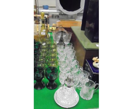 A collection of nine 20th Century Bristol Green glass roemers, a collection of twelve pale green glass roemers with decanter 