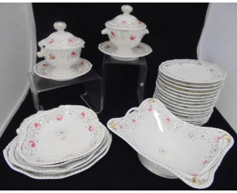 A Bloor Derby rose and gilt decorated part dinner service comprising fifteen plates, two sauce tureens, covers and stands, fr