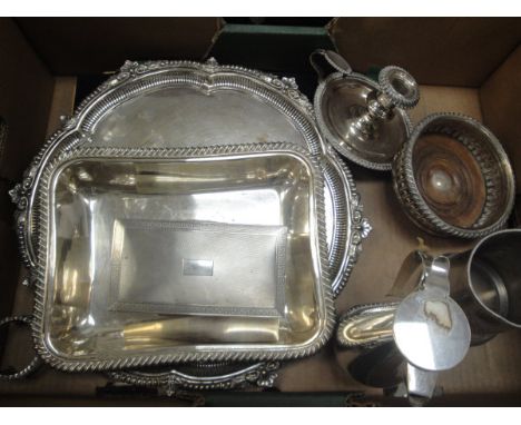 A box of plated ware to include silver and engine-turned cigarette box, tureen base, drinks tray, chamberstick, water jug, a 