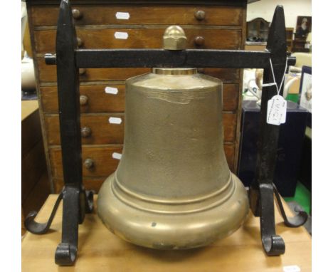 An Elizabeth II brass ship's bell inscribed "ER" with crown cypher and "SCC 7/56 SC9C" on a purpose built wrought iron stand