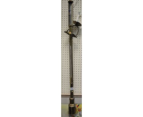 A 19th Century brass cased ship's stick barometer on a gimbal mount marked "No. 107"