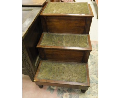A 19th Century mahogany three tier bed step commode with pottery liner