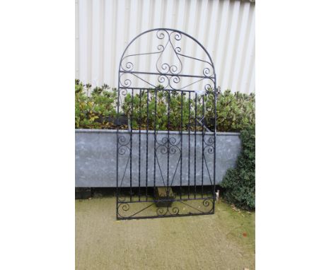 A painted wrought iron gate