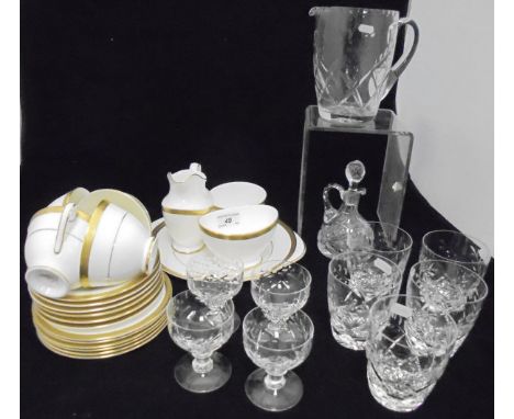 A Royal Doulton "Royal Gold" pattern tea service comprising six cups and saucers and tea plates, cream jug, sugar bowl and sa