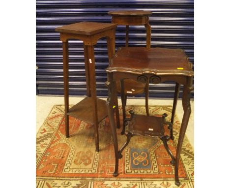 An Edwardian mahogany and inlaid two tier plant stand, an oak two tier plant stand, two mahogany occasional tables with pie c