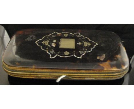 A tortoiseshell, yellow metal and mother of pearl inlaid manicure box containing various manicure tools