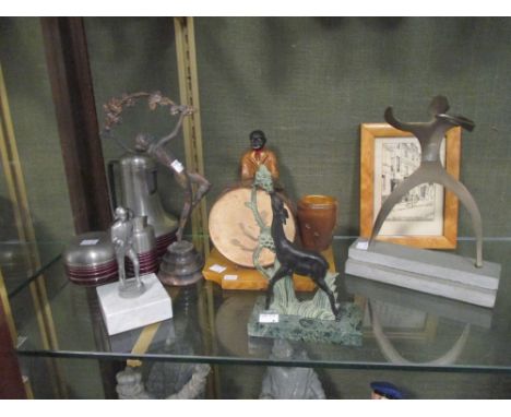 An Art Deco style figure of a lady, together with an Art Deco style deer, a cut out figure of a man, a metal figure of a hike