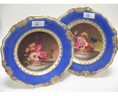 A pair of Grainger's Worcester cabinet plates painted with baskets of flowers  