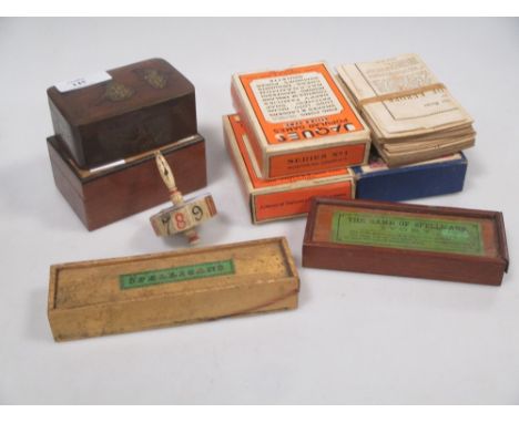 A collection of various games, to include spillikens, dominoes, cards and a rotary die  