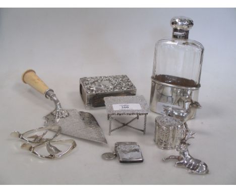 A silver mounted glass hipflask, a Dutch miniature table, various small silver boxes and a presentation trowel  