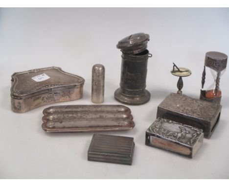 An early 20th century silver and ivorine miniature date sundial, an egg timer, a perfume bottle and various other small silve