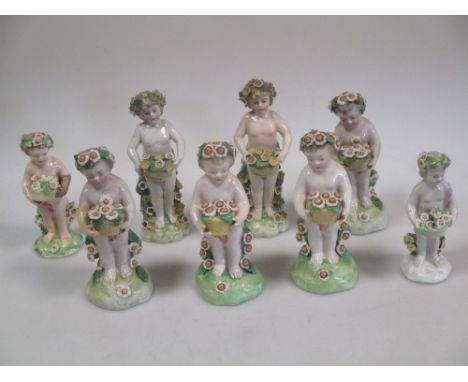 A Derby patch makred figure, together with seven others similar  