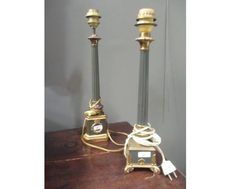 A pair of metal table lamps in the form of fluted columns, together with a similar standard lamp (3)  