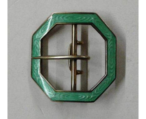 A silver and enamel buckle