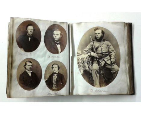 A book containing various photographic portrait studies