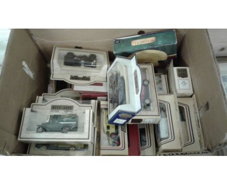 A box containing various Days Gone and other die-cast model cars 