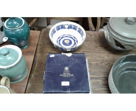 Two boxes Royal Worcester collector's plates together with a Royal Worcester fruit bowl