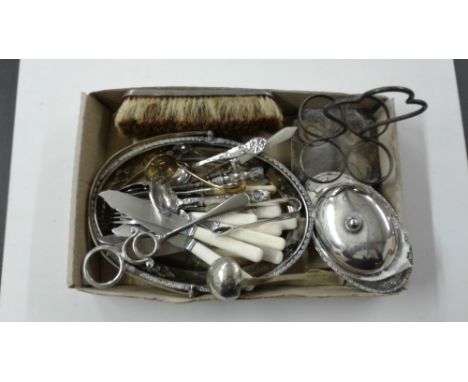 A box containing a small silver ladle; a cruet stand; various other cutlery; a white metal brush decorated with a dragon etc.