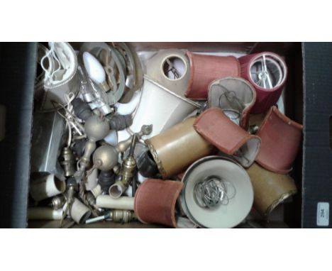 A box of various light shades and light fittings
