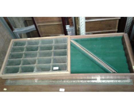 Two wall mounted model display cabinets