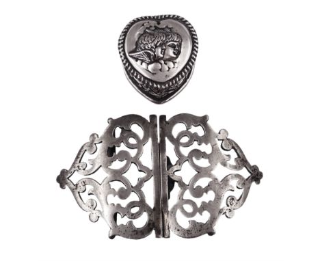 Victorian silver heart shaped trinket box, the hinged cover decorated in relief with two putti masks, opening to reveal gilt 