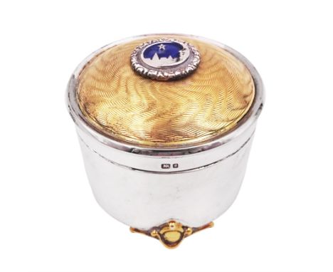 Modern silver limited edition Christmas music box, of circular form, with engine turned parcel gilt wave decoration and appli