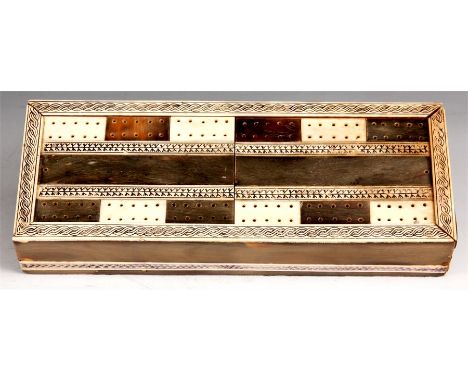 A 19th Century Anglo Indian Ivory GAMES BOX with divided slide-out lid marked out as a Cribbage Board 25cm by 9.5cm