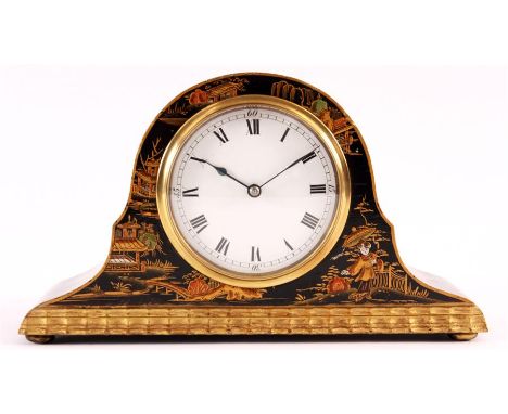 A black Lacquer chinoiserie decorated arch-top MANTEL CLOCK with splayed sides and bun feet circa1900-20. The white enamel co