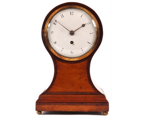 A late Georgian cross banded and inlaid Satinwood BRACKET CLOCK the balloon shaped case on a moulded plinth with brass bun fe