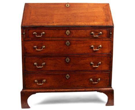 An early George III solid Walnut BUREAU of fine colour and patina with fitted interior of small drawers and alcoves enclosed 