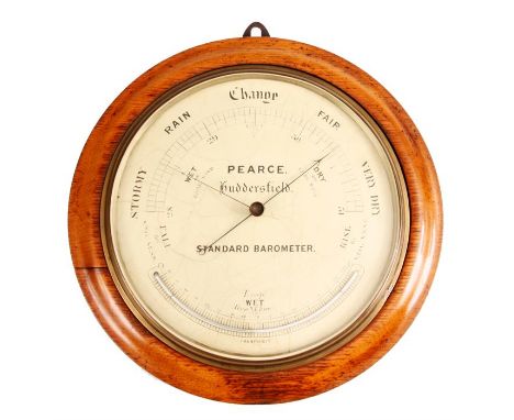 PEARCE HUDDERSFIELD A late 19th Century Oak cased giant ANERIOD BAROMETER with painted dial, curved mercury thermometer and a