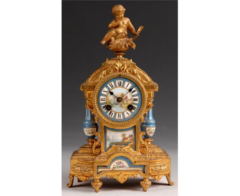 A 19th Century French ornate Gilt Brass and Sevres style Porcelain panelled MANTEL CLOCK with panelled front and side columns