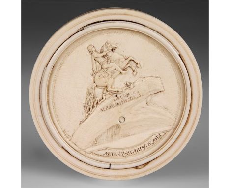 An 18th/19th Century Russian circular Ivory SNUFF BOX with&nbsp;Tortoiseshell interior; the lid carved with a recessed panel 