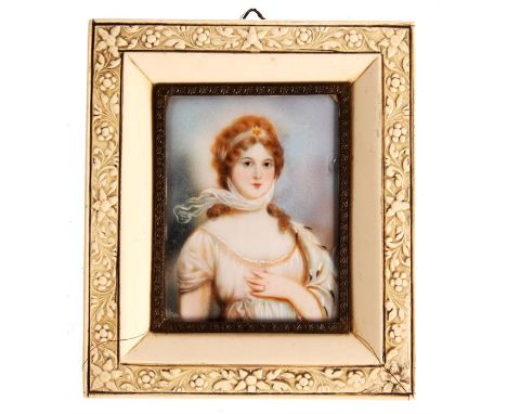 A half length miniature&nbsp;PORTRAIT of a young Lady in ivorine frame with floral and leafwork border&nbsp;8.5cm by 6.5cm pl