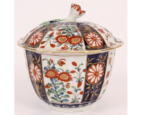 A First Period Worcester Polychrome circular BOWL and COVER with moulded body and flower spray finial to the lid, colourfully
