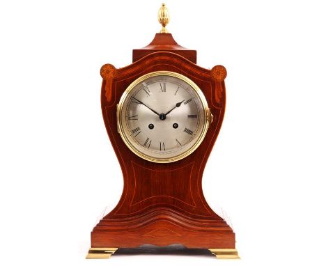 A good late 19th Century inlaid Mahogany&nbsp;shield shaped&nbsp;MANTEL CLOCK of large size&nbsp;with brass centre finial and