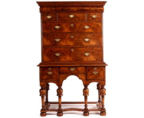 A good late 17th/early 18th Century herringband strung figured Walnut CHEST ON STAND with cross grain moulded borders the pro