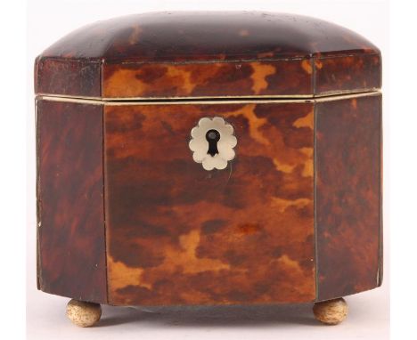 An early Victorian unusually small Tortoiseshell TEA CADDY of clipped rectangular form with domed lid lined to the interior, 
