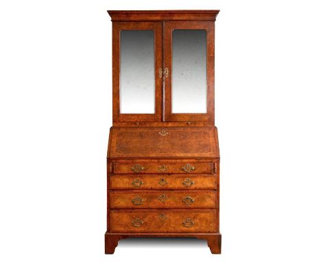 A Geo I Burr Walnut&nbsp;herringband strung BUREAU BOOKCASE the mirrored moulded top with pull out candle slides and fitted i
