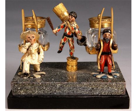 An&nbsp;unusual late 19th Century Austrian miniature PEN and INK STAND&nbsp;modelled as painted metal figures holding an ink 