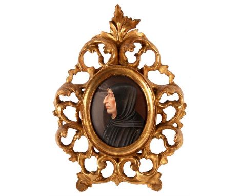 A 19th Century Florentine oval miniature BUST PORTRAIT of a monk robed in black 8cm by 6.5cm - highly ornate leaf carved and 