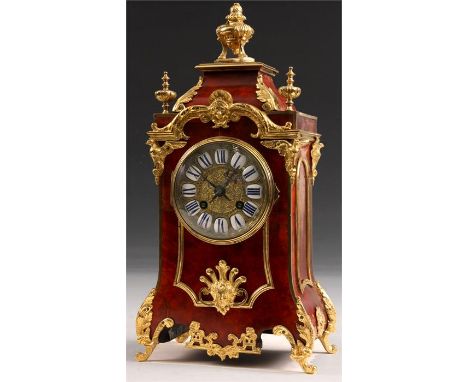 A 19th Century Louis XVI style ornate gilt brass and Red Tortoiseshell MANTEL CLOCK&nbsp;with mask head and leaf work mounts,