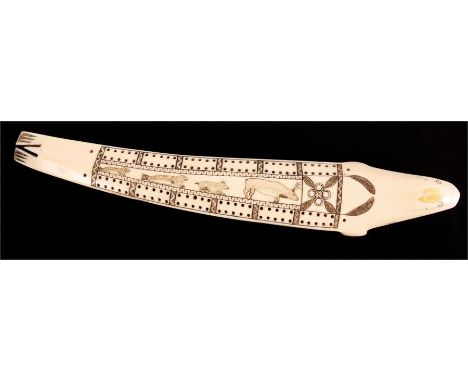 A 19th Century ESKIMO SEAL'S TUSK CRIBBAGE BOARD of Scrimshaw type finely engraved with huntsman, animals and seals 33.5cm ov