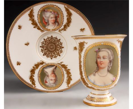 A 19th Century Sevres style large gilt edged white ground CABINET CUP and SACUER of unusual shape painted with a central oval