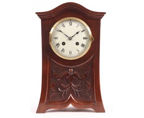 A late 19th Century Art Nouveau style&nbsp;Mahogany&nbsp;MANTEL CLOCK with carved&nbsp;panelled&nbsp;front and&nbsp;waved&nbs