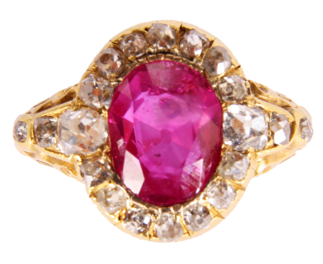 A fine 18ct Yellow Gold oval Ruby and Diamond CLUSTER RING with&nbsp;scroll cut shanks &nbsp;