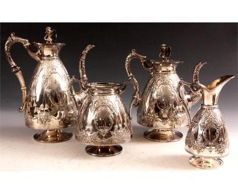 A late&nbsp;Victorian Walker and Hall Silver Plated four piece TEA AND COFFEE SERVICE of footed form with florally embossed a