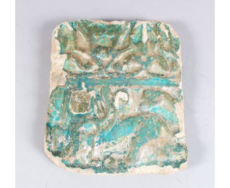 A 12TH CENTURY ILKHANID PERSIAN KASHAN POTTERY TILE with griffin beast, 19cm x 16cm.
