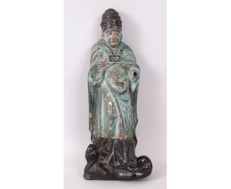 A CHINESE POTTERY FLAT BACK FIGURE OF A SAGE, turquoise paint. 31cm high.
